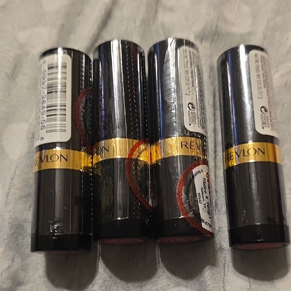 4 Revlon Lipstick Collection with Black and Gold Accents